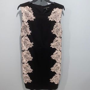 Sleeveless black dress with beautiful lace accents